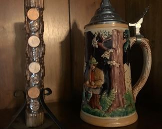 Penny candle and beer stein.
