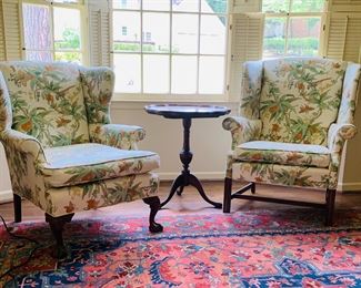 Upholstered wingback armchairs