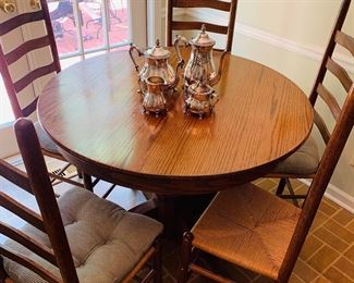 Round pedestal table with 5 ladder back chairs