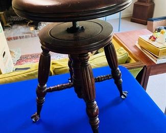 Antique wood claw foot piano stool