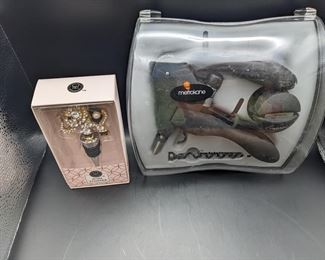 Corkscrew and bottle stopper