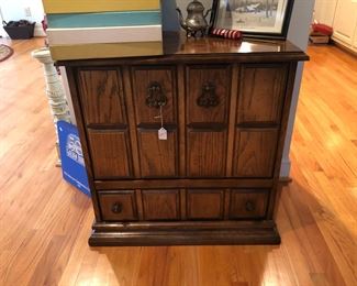 Record cabinet and lots of albums to choose from. 