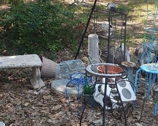 cement bench, metal yard art for plants