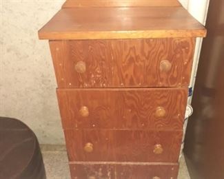 Small wooden 4 drawer stand. Needs work. 27 x 17 x 12