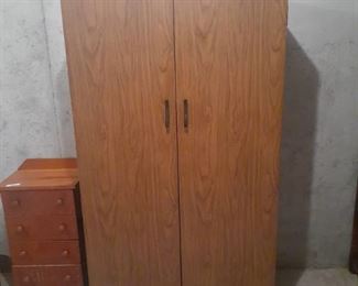 Metal storage or closet. 63 x 36 x 20. Located in basement  (has walkout)