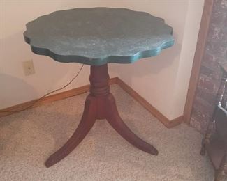 Round wood side table. 28 x 28 diameter. Located in basement (has walkout)