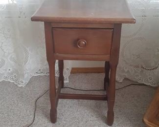 Wooden side table with a drawer. 28 x 16 x 14. Located in basement (has walkout)