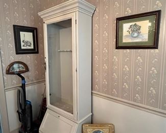 Restored gun cabinet . Great for displaying folded quilts!
Hand painted paintings! 
Sorry mirror broke so not available