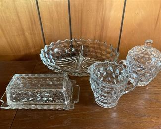 Fostoria • American Pattern •
 - Butter Dish • $16.50
- Divided Oval Server • $16.50
- Creamer • $12
- Covered Sugar Bowl • $12