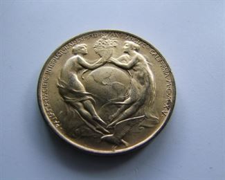 Lot 027  1915 Rare Bronze Medallion commemorating the opening of the Panama - Pacific Exposition and the Panama Canal.  1 1/2" dia., dated 1915, available to purchase on opening day only.  Cond:  Minor wear to the original gilt.  Est. $70-100. 