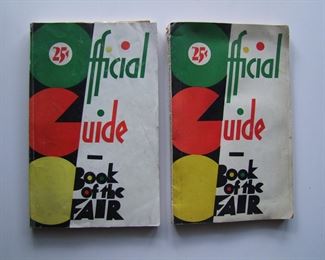 Lot 033   1933 2 "Official Guide Book of the Fair", 194 pages.  Heavily illustrated, color covers, both have their fold-out maps at the front, 6" x 9 1/4".  Cond.  Both guides have minor wear with one having a small loss on the spine at the top edge.  Est. $60-100.