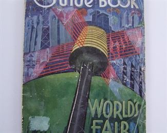 Lot 036    1934 "Official Guide Book, World's Fair 1934", 192 pages.  Heavily illustrated with photos of the Main Buildings, plus exhibits and local points of interest.  Also includes a fold out map in the front, 5 3/4" x 8 1/2".  Cond:  Moderate wear with creases on cover, back page almost separated.  Est. $30-50.