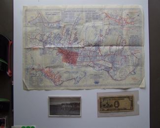 Lot 050   1938 USO Honolulu map w/Bus Guide and locations of all Military Bases (including housing) & Points of Interest, 2-sided, 2-color.  Includes Mokuola Club postcard and a small group of pre WW2 Asian money, 21" x 14 1/2" h.          Cond:  Minor wear overall.            Est. $40-60.