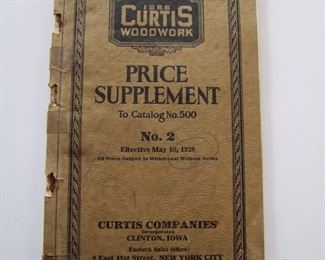 Lot 057   1928 Curtis Woodwork Catalog #2, 186 pages.  Illustrated, mostly home construction elements incl. doors, windows, fireplaces, built-in furniture and moldings, 5" x 8" h.  Cond:  Cover is almost loose with tape repairs.  Est. $30-50.