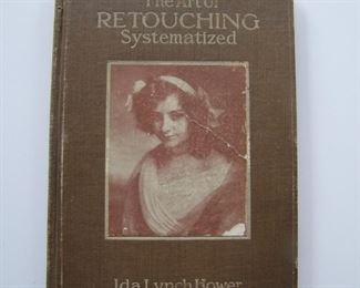 Lot 167   1908 "The Art of Retouching (Photographs), Systematized" by Ida Lynch Hower, hard bound.  Illustrated guide to retouching glass plate negatives and Albumen photos, 5" x 8" h.  Cond:  Moderate wear overall.  Est. $40-60.