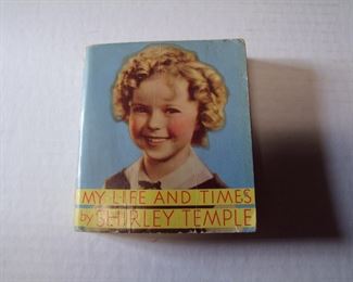 Lot 178    1936 "My Life & Times by Shirley Temple" Big Little Book. 4 1/2" X 5" X 1", Photo Illustrated.    Cond: Cover is partially loose, 1st end sheet page is missing a section    Est. $20-30