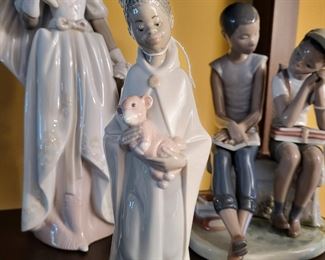 Lladro Black Legacy “boy wearing a robe and crown holding a lamb”