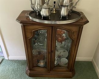 Small cabinet with pewter set