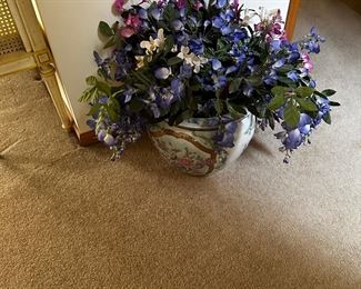 Silk flowers in Asian motif urn
