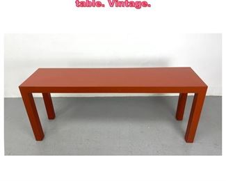 Lot 609 Rust color laminate parsons table. Vintage. 