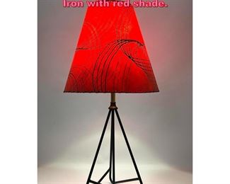 Lot 665 Frederic Weinberg table lamp. Iron with red shade. 