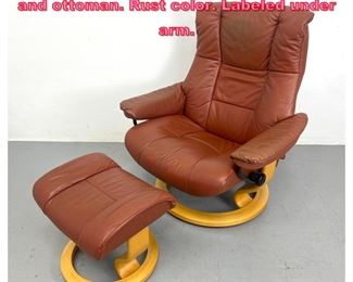Lot 755 EKORNES leather recliner chair and ottoman. Rust color. Labeled under arm. 