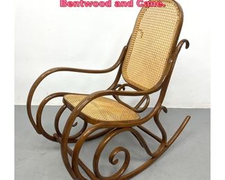 Lot 769 Thonet rocking chair. Marked. Bentwood and Cane. 