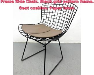 Lot 796 HARRY BERTOIA for KNOLL Metal Frame Side Chair. Black grid pattern frame. Seat cushion. Paper label.