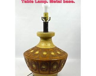 Lot 827 Mid Century Modern Carved Body Table Lamp. Metal base.
