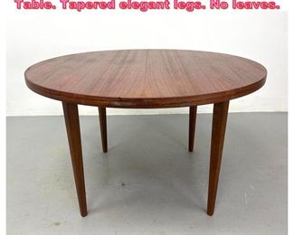 Lot 848 Round Danish Modern Teak Dining Table. Tapered elegant legs. No leaves. 