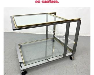 Lot 849 Romeo Rega style bar cart Server on casters. 