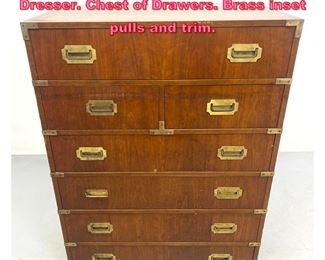 Lot 878 Modernist Campaign style Tall Dresser. Chest of Drawers. Brass inset pulls and trim. 