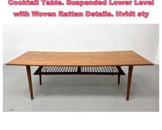 Lot 880 Danish Modern Teak Coffee Cocktail Table. Suspended Lower Level with Woven Rattan Details. Hvidt sty