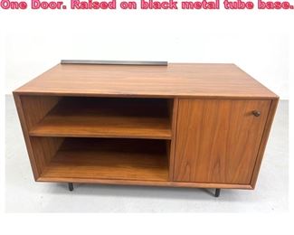 Lot 898 Mid Century Modern Cabinet with One Door. Raised on black metal tube base. 