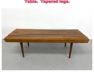 Lot 929 Modernist Slat Bench Coffee Table. Tapered legs. 