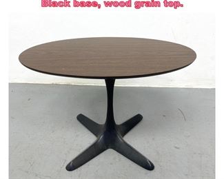 Lot 940 Oval Burke style Pedestal table Black base, wood grain top.