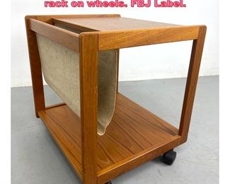 Lot 943 Teak Danish side table magazine rack on wheels. FBJ Label. 