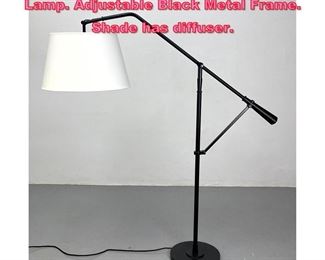Lot 945 Contemporary Cantilever Floor Lamp. Adjustable Black Metal Frame. Shade has diffuser. 