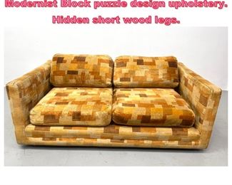 Lot 995 Modernist 70 s Love Seat Couch. Modernist Block puzzle design upholstery. Hidden short wood legs. 