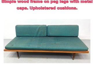 Lot 1003 Danish Modern Daybed Platform. Simple wood frame on peg legs with metal caps. Upholstered cushions. 