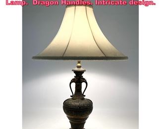 Lot 1036 Asian Bronze Urn Form Table Lamp. Dragon Handles. Intricate design. 