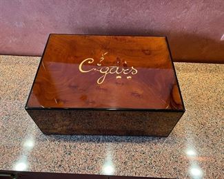 Inlaid Humidor with Cigars written in script with 3 cigars. Measures 15.75” x 11.5”x 6.75” 