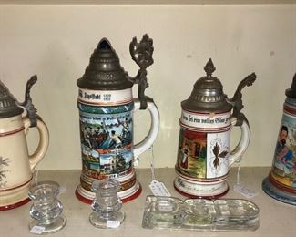 Beautiful German steins with decorative pewter tops.
