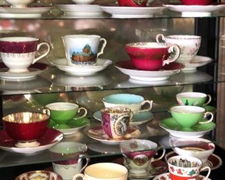 Large selection of vintage cups and saucers.