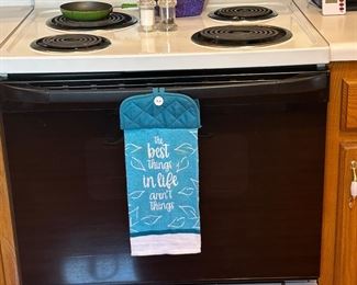 GE electric stove and oven works great .