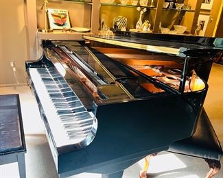 $2,200
WM KNABE & CO. EBONY POLISHED BABY GRAND PIANO
Model 610
58”W x 75”L x 39”H