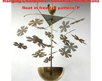 Lot 1125 Paavo Tynell style Snowflake Hanging Chandelier. Snowflake medallions float in free fall pattern. P