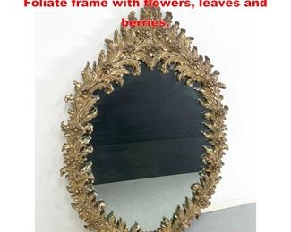 Lot 1316 Ornate Framed Oval Wall Mirror. Foliate frame with flowers, leaves and berries.