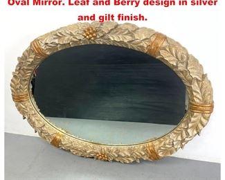 Lot 1322 Very Large Decorator Carved Wood Oval Mirror. Leaf and Berry design in silver and gilt finish. 
