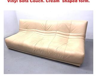 Lot 1370 Modernist Togo Style Sofa Couch. Vinyl Sofa Couch. Cream shaped form. 